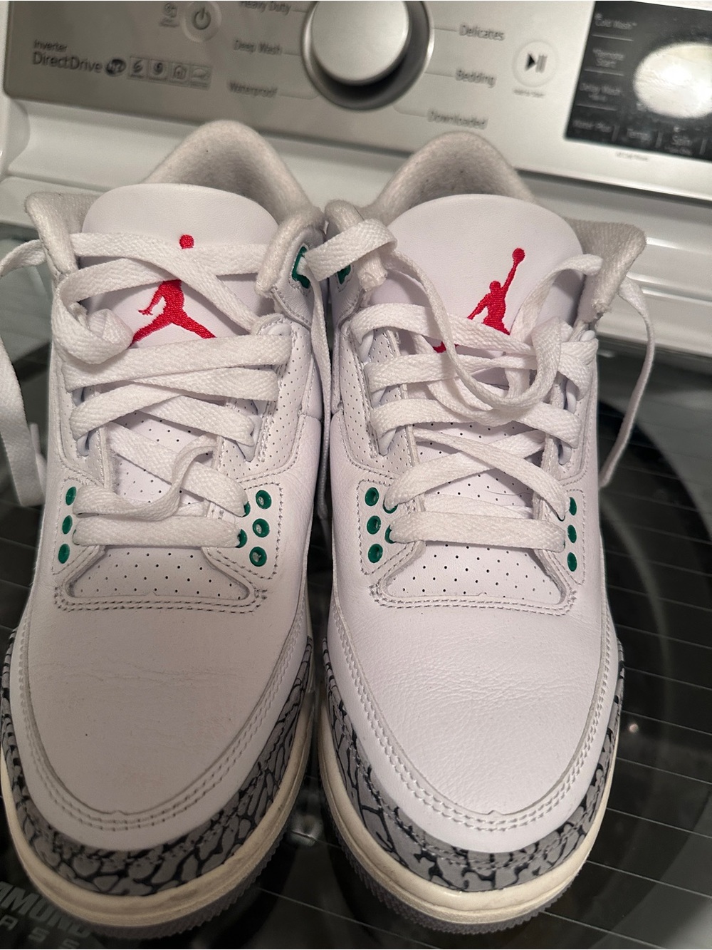 Nike Jordans woman’s White Sneakers with Red Jumpman and Green Eyelets